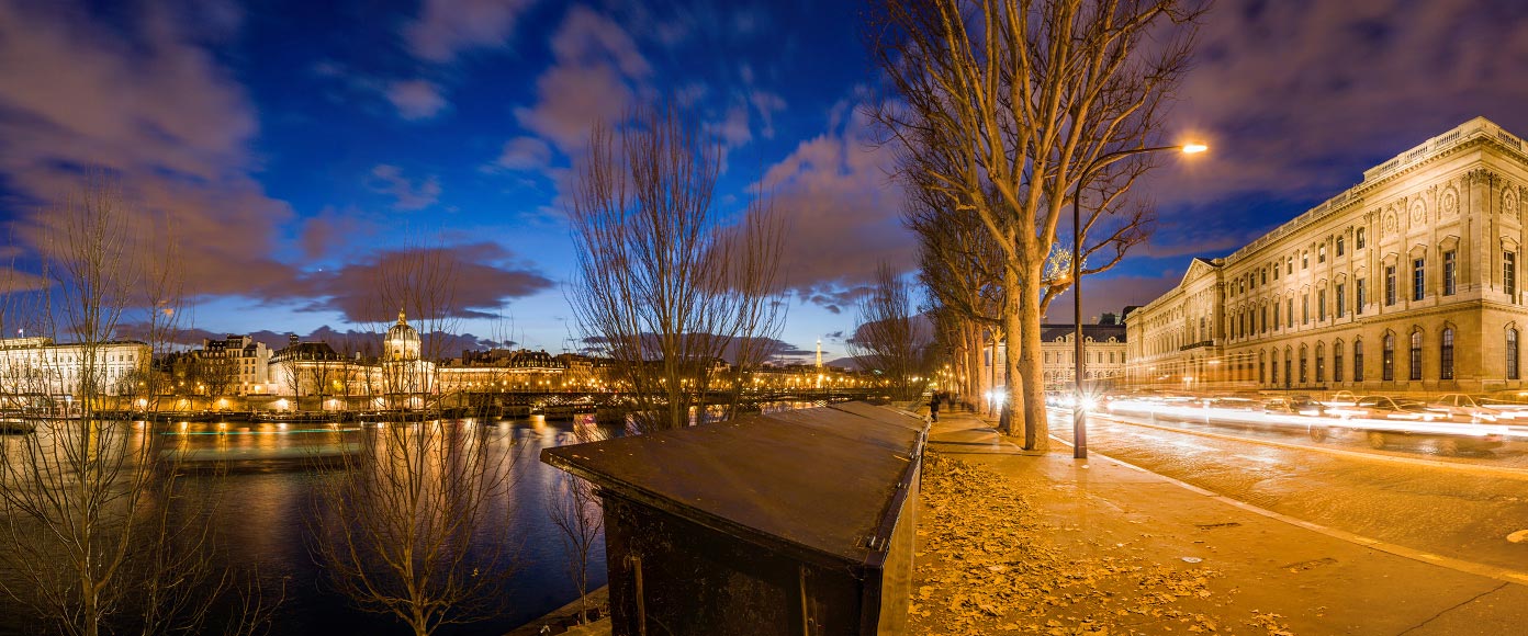 Le quai du Louvre, la Seine et l'institut de France au crépuscule.