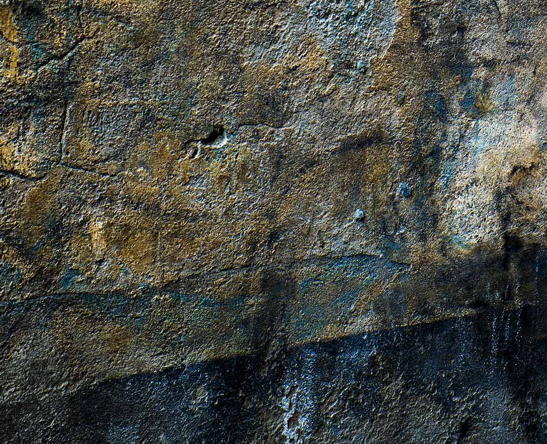 Détail d'un vieux mur en crépi dans le vieux Clermont-Ferrand